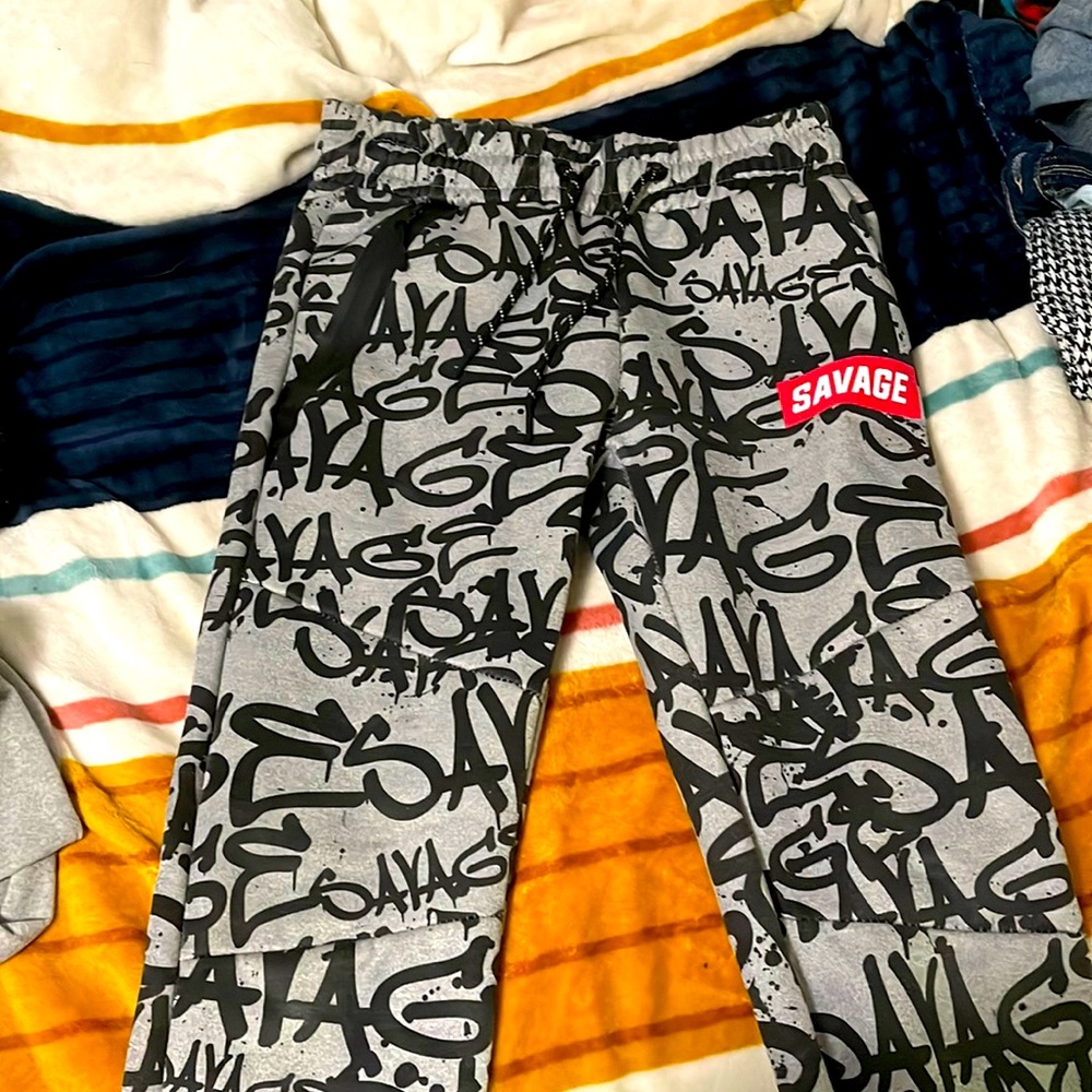 Black and grey sweats says savage all over them just don’t fit